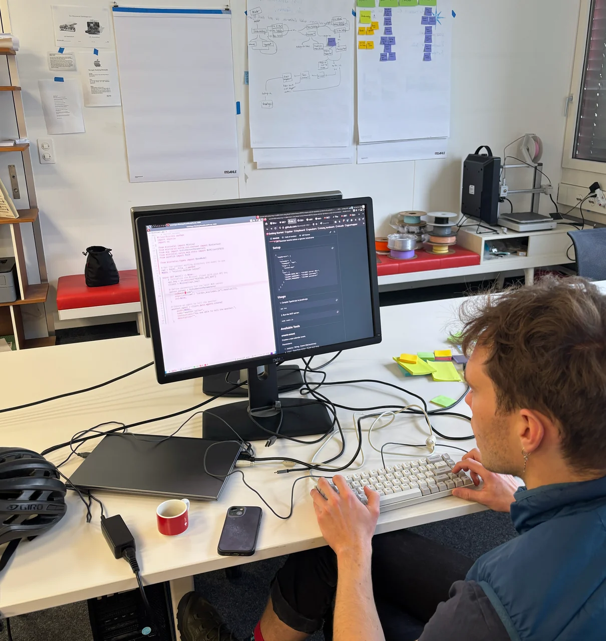 A colleague focused on work at a desk